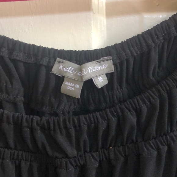 Black flirty top. - Picture 2 of 4